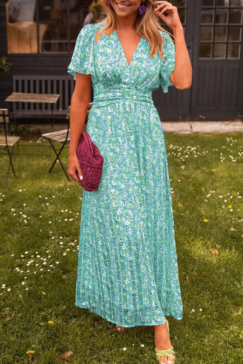 Font pose wearing colorful garden event dress