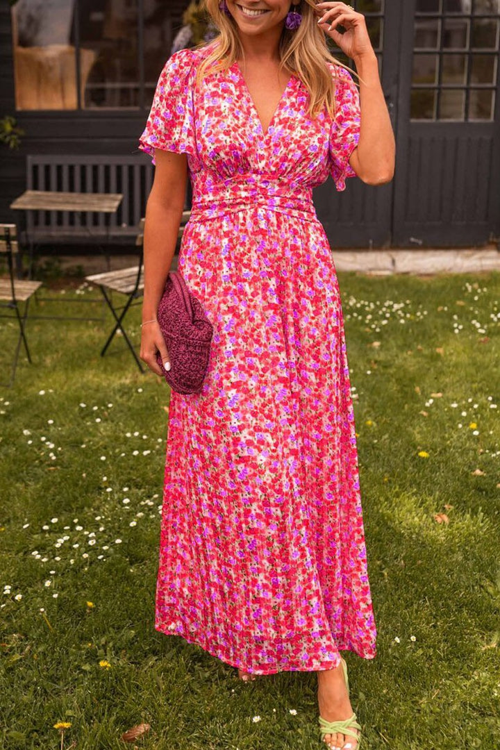 Bright pink floral dress with short flutter sleeves