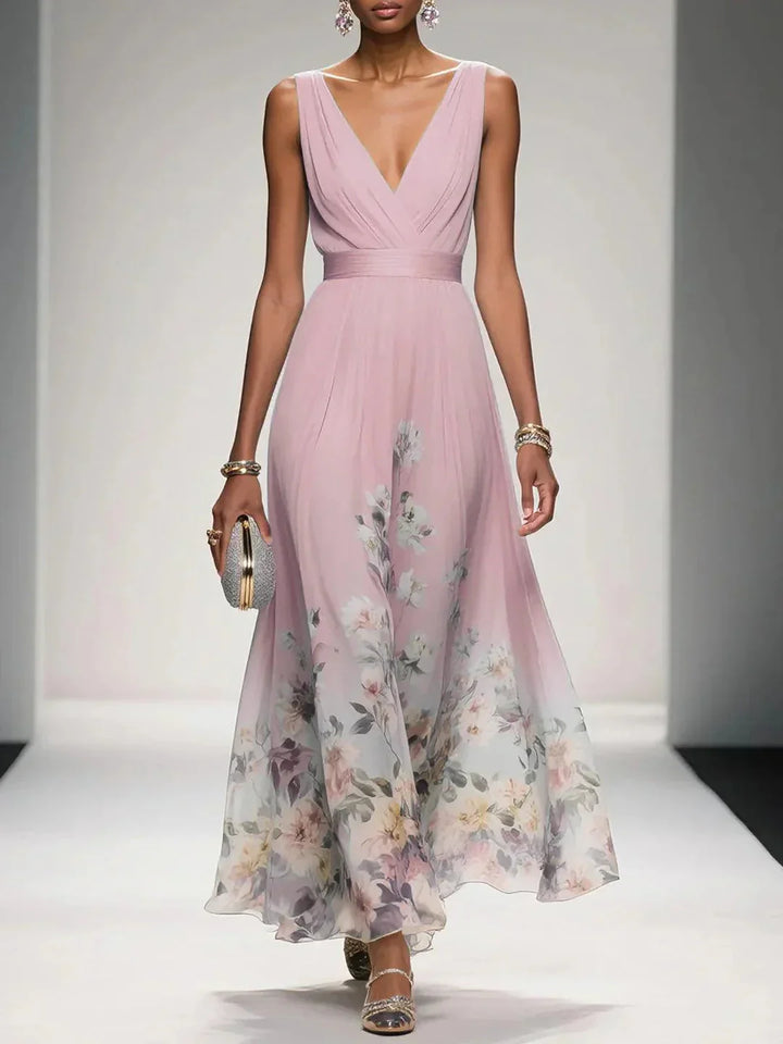 Model at runaway in full length floral dress product shot