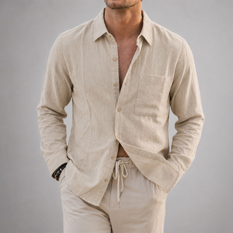  Woman wearing a relaxed everyday shirt against a plain background.