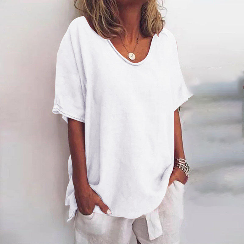 Female model in breathable blouse on plain background