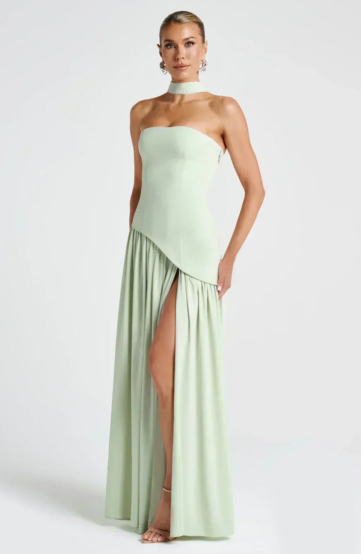 Female model wearing an asymmetric formal dress