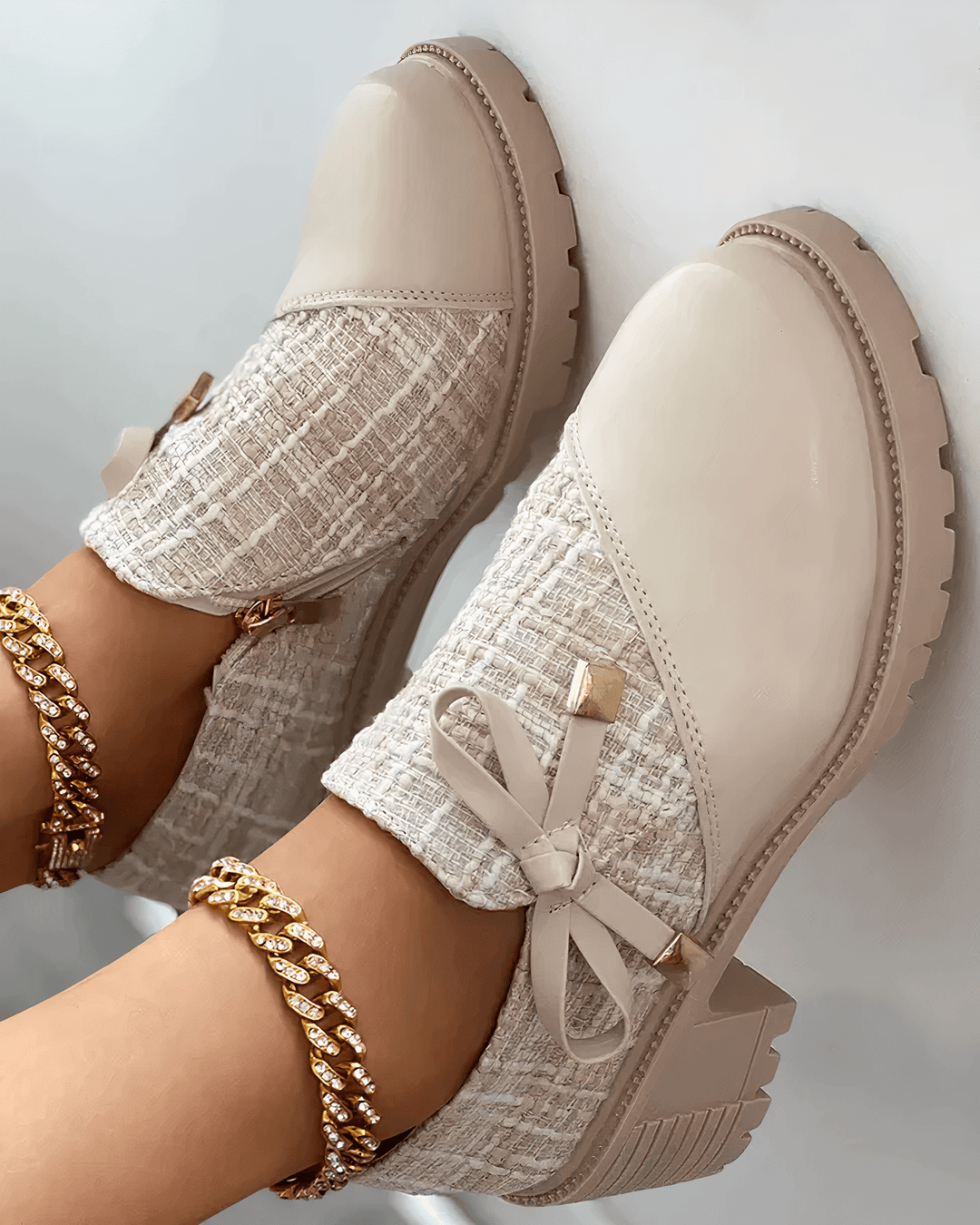 Top pose foot model showing stability in loafers plain background