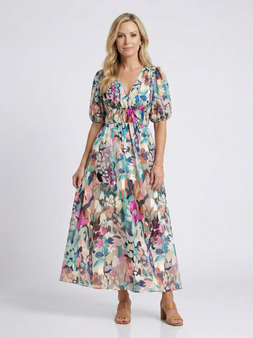 Female wearing a floral V-neck midi dress against a plain background.