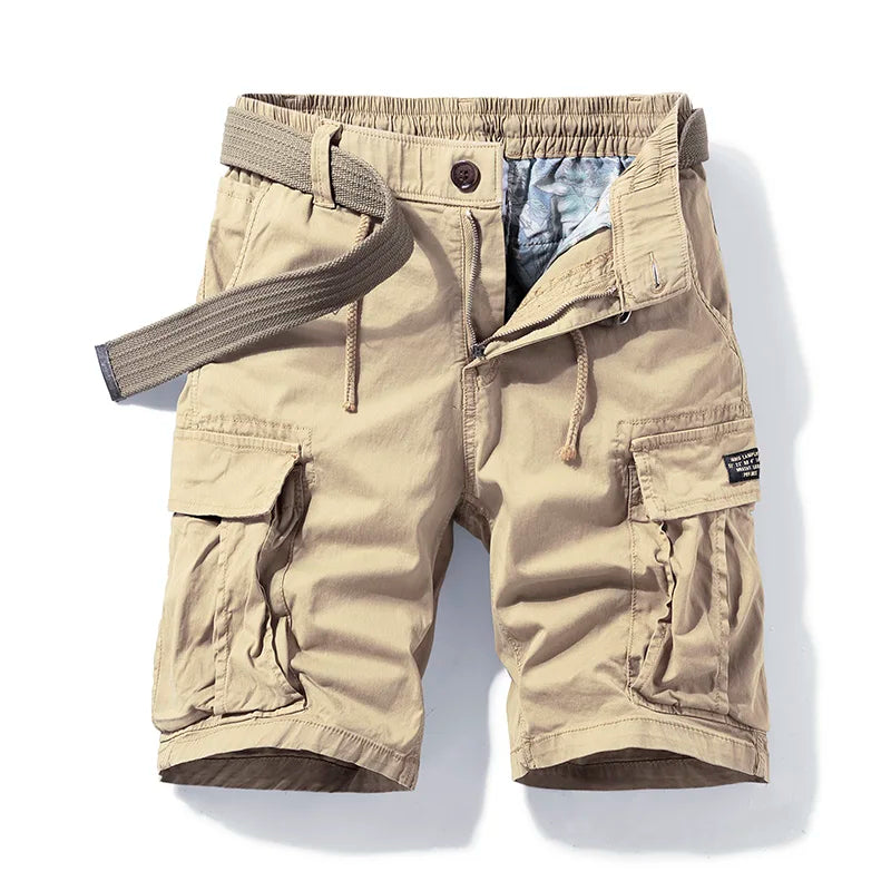  Male model showing relaxed cotton cargo shorts with a clean everyday look.
