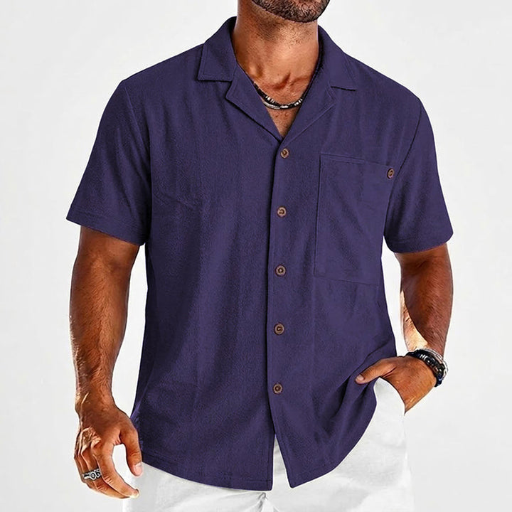  Male model styled in a breathable textured shirt against a plain background.