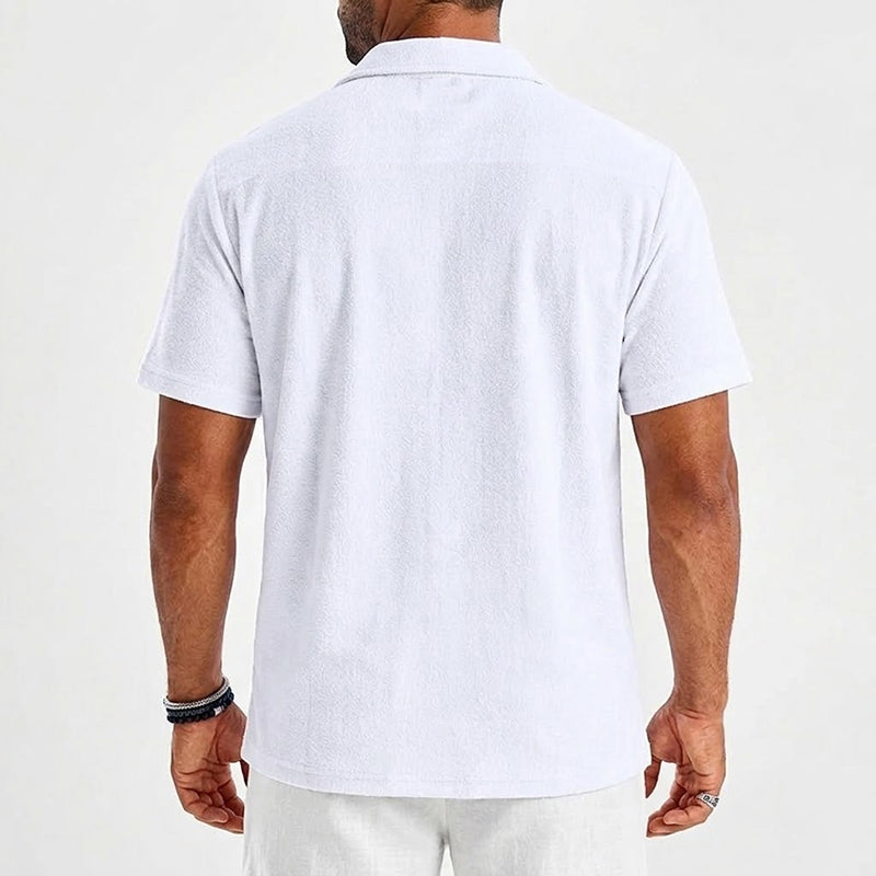  Male model in a laid back open collar shirt with a clean finish.