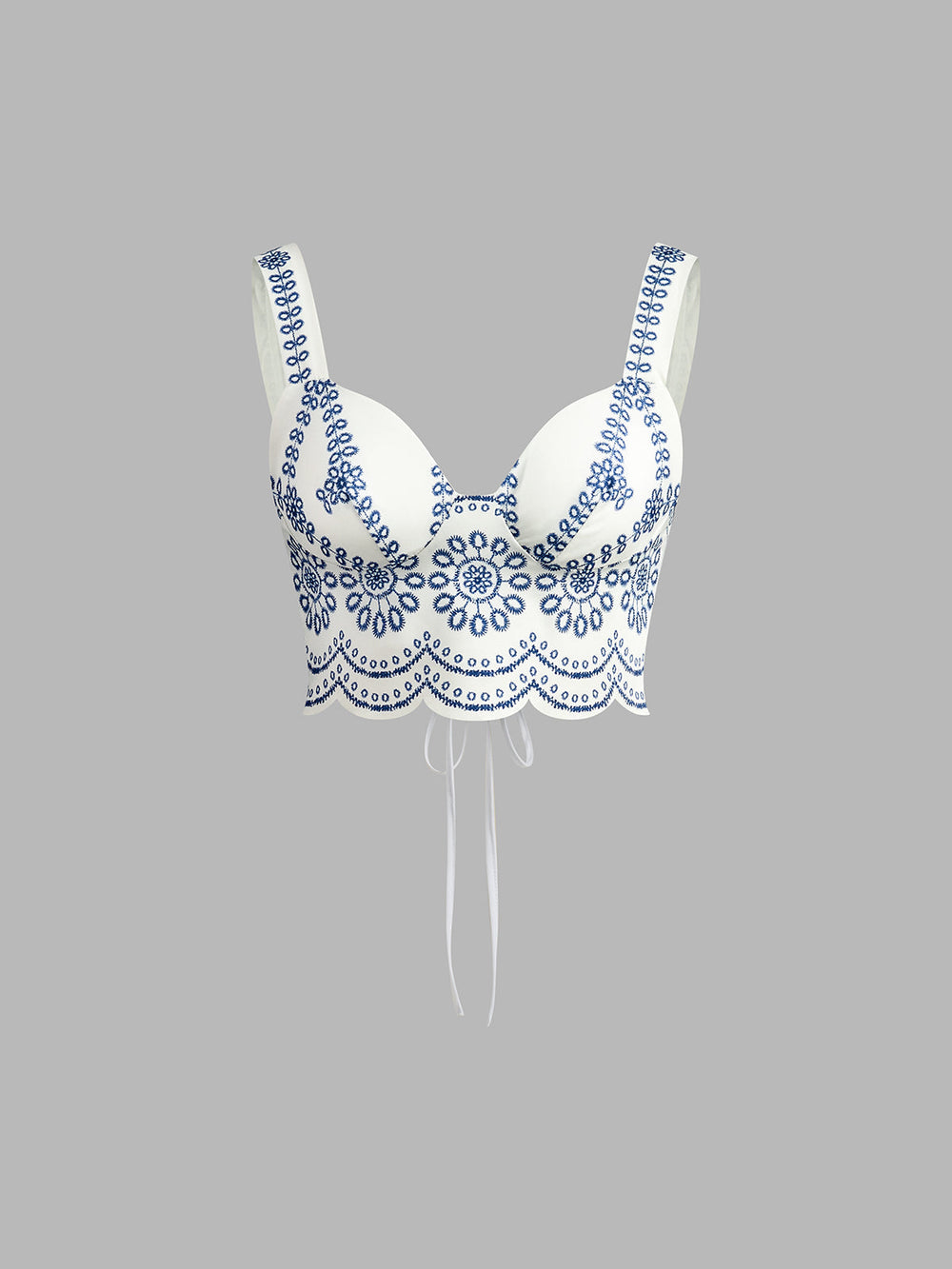 A matching blue print top on a plain background.
