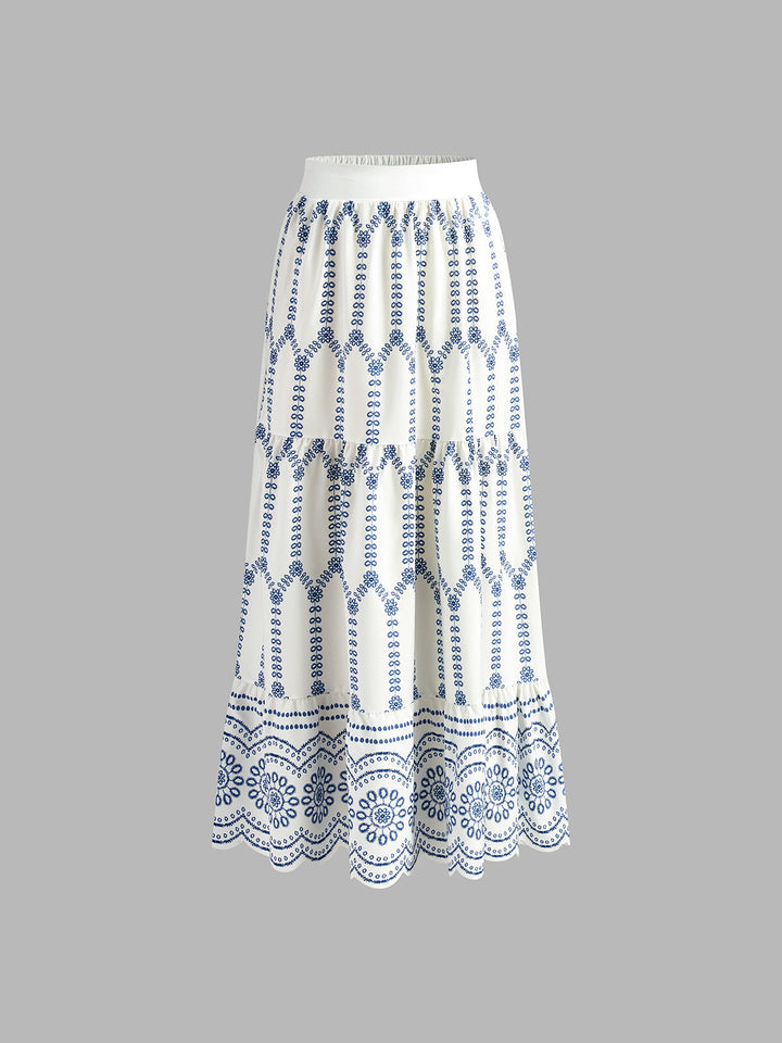 A summer outfit with an all-over blue pattern on a plain background.