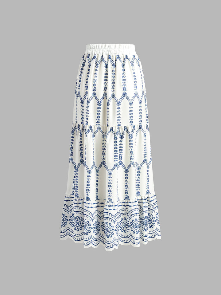 A blue and white printed skirt set on a plain background.
