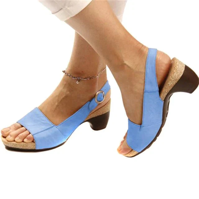 Foot model standing naturally wearing elegant slingback heel sandals