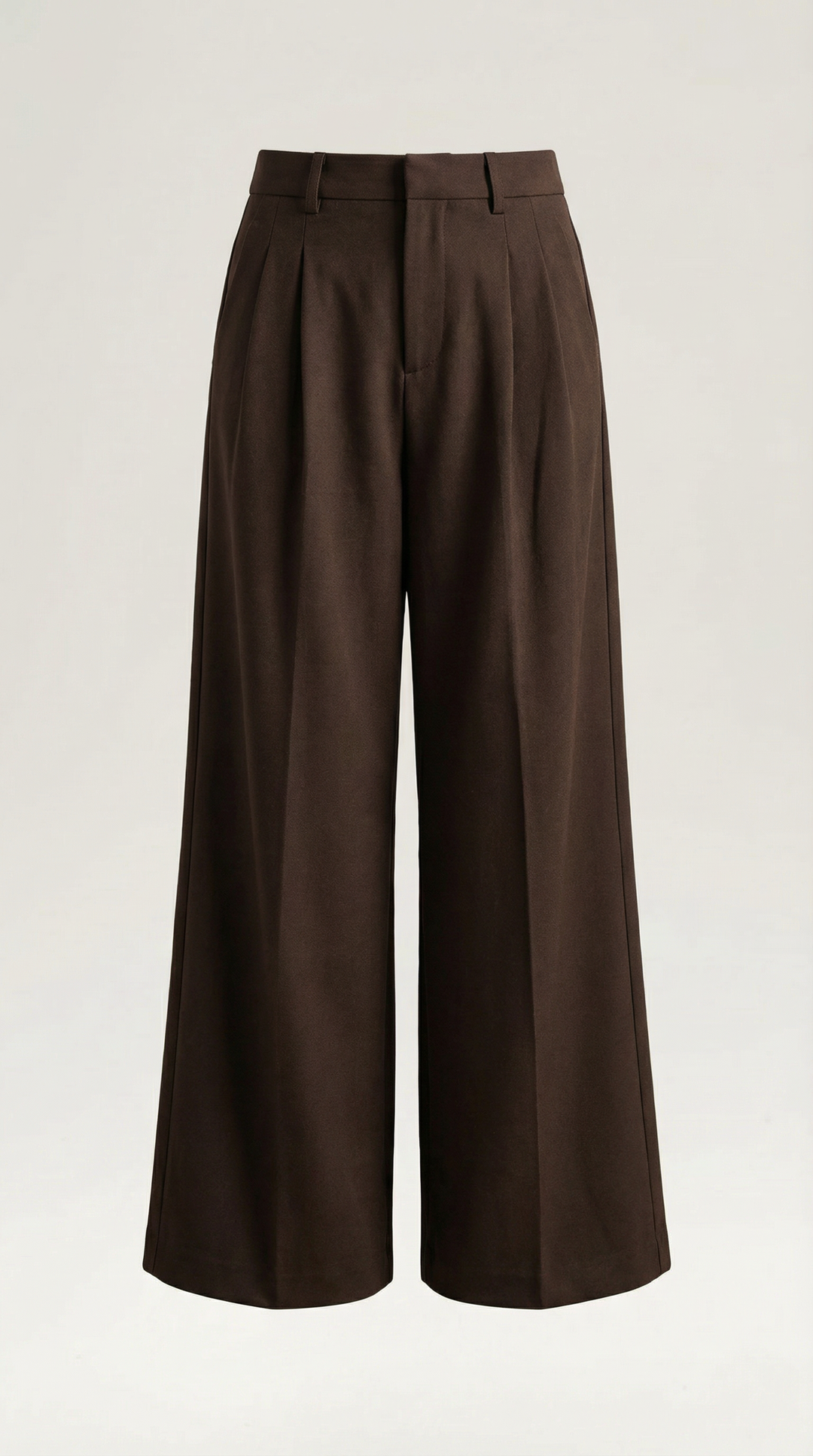 Close-up fabric detail trousers on woman plain background lighting