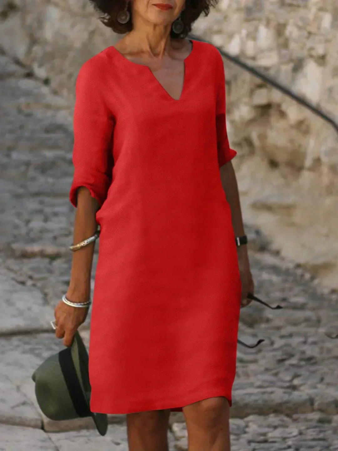 Woman in red dress with bracelet styled look