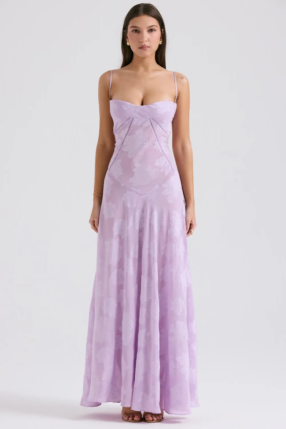 Summer-ready maxi dress with adjustable straps shown on a female model.