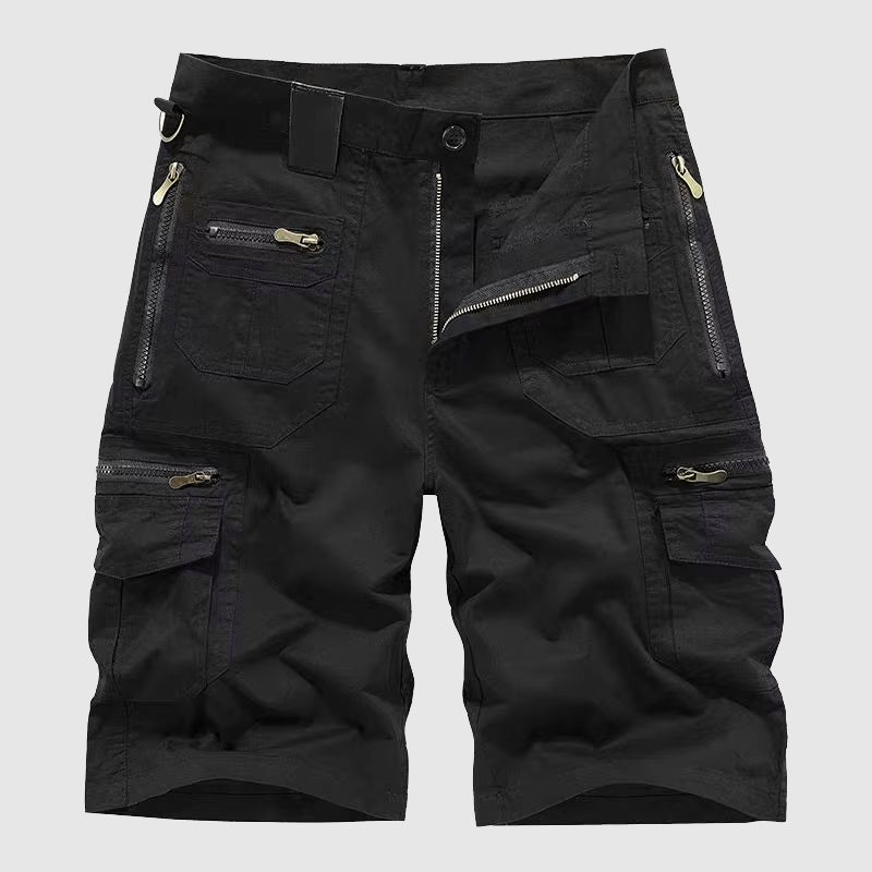  Woman displaying casual cargo pants with a structured fit on a plain background.