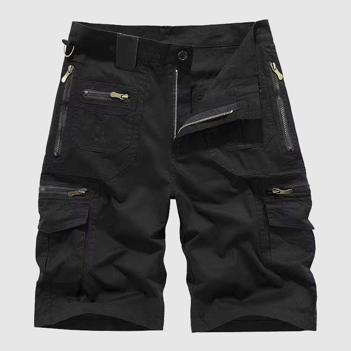  Woman displaying casual cargo pants with a structured fit on a plain background.