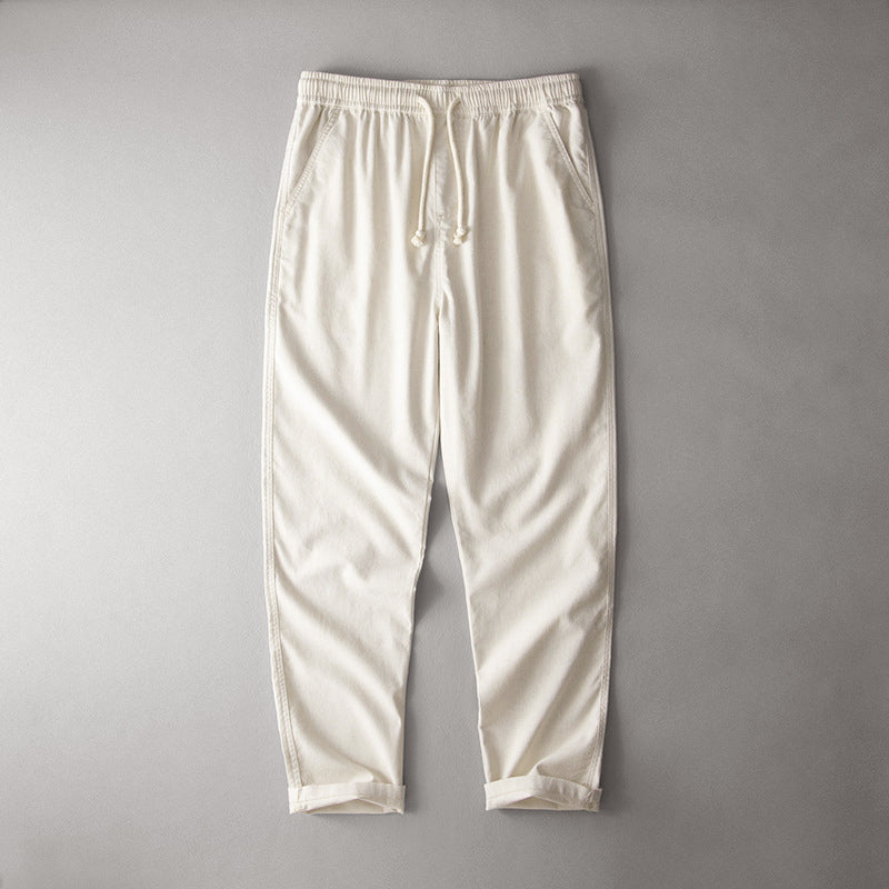 Lightweight casual pants with a comfortable silhouette on a plain background.