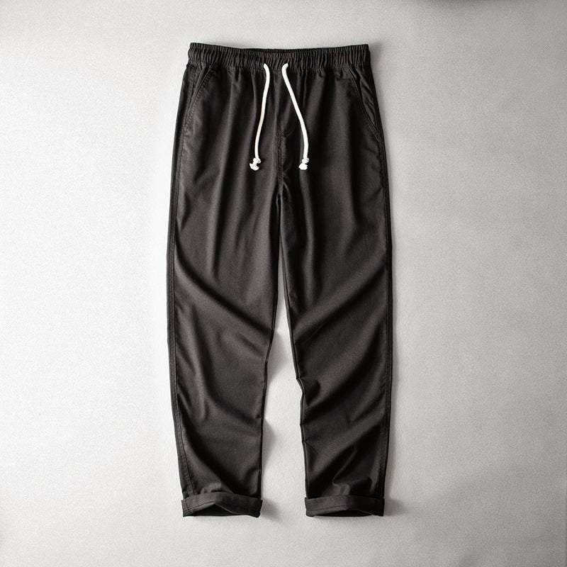 Airy drawstring pants designed for everyday wear on a plain background.