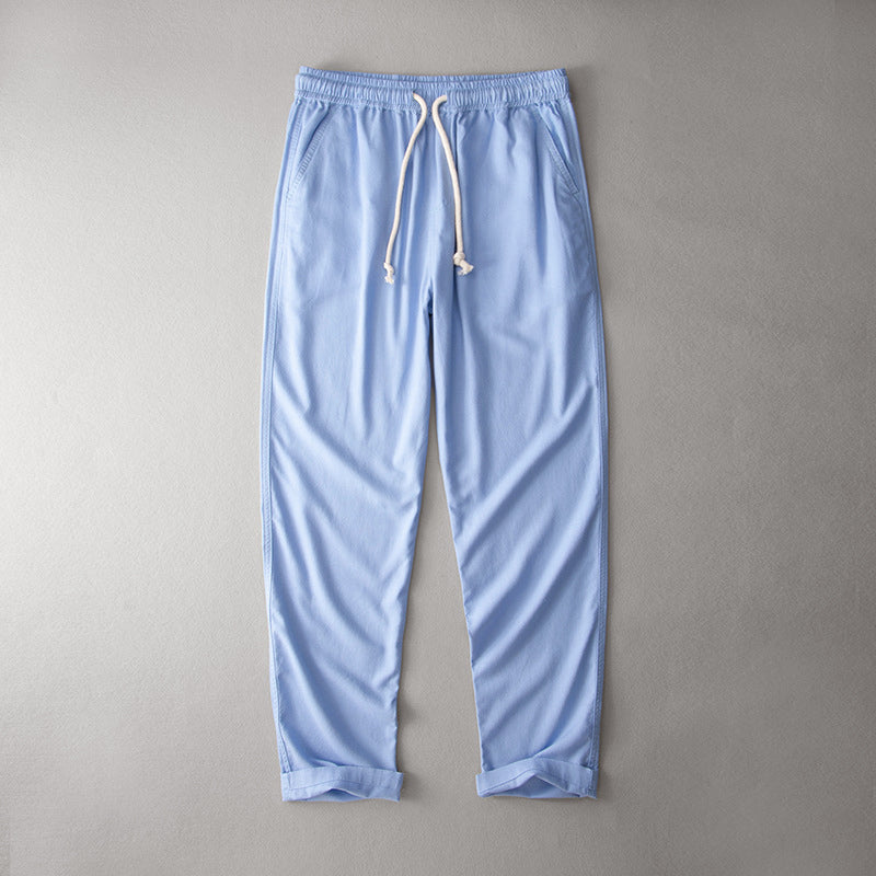 Loose fit casual pants with a clean look on a plain background.
