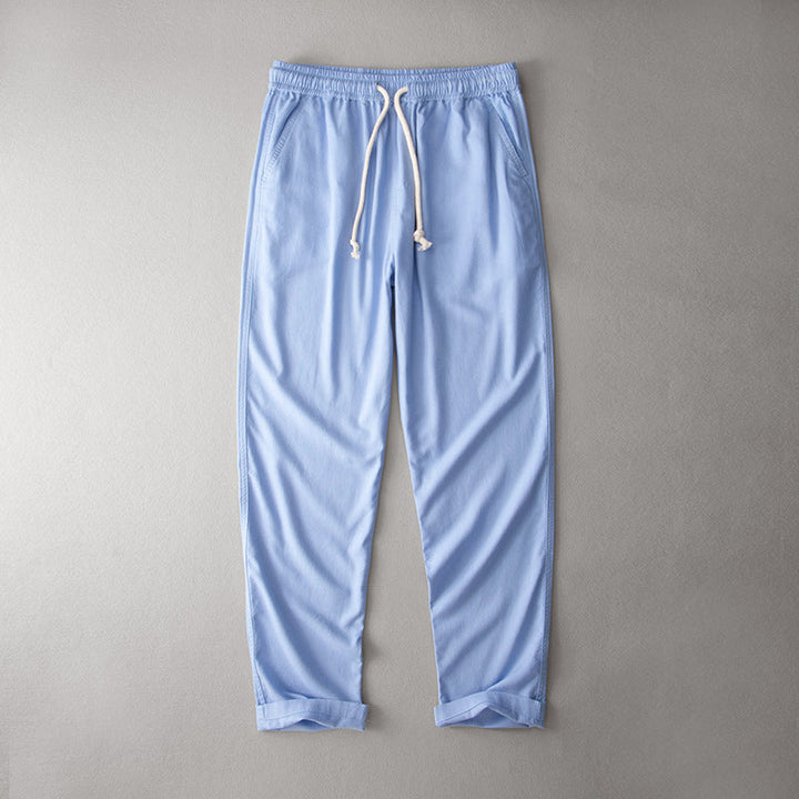 Loose fit casual pants with a clean look on a plain background.