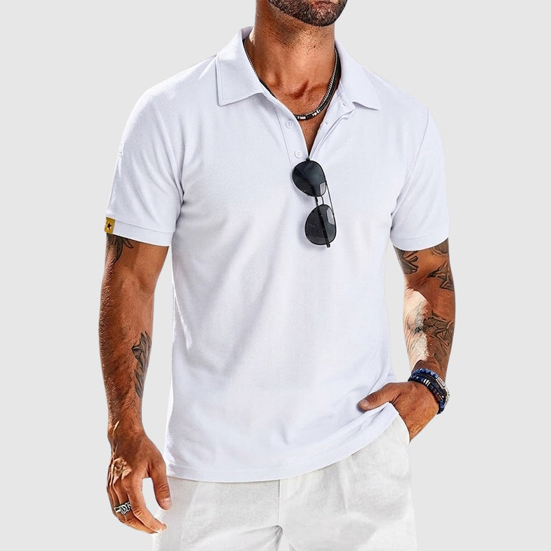  Male model wearing a short sleeve textured polo shirt on a plain background.