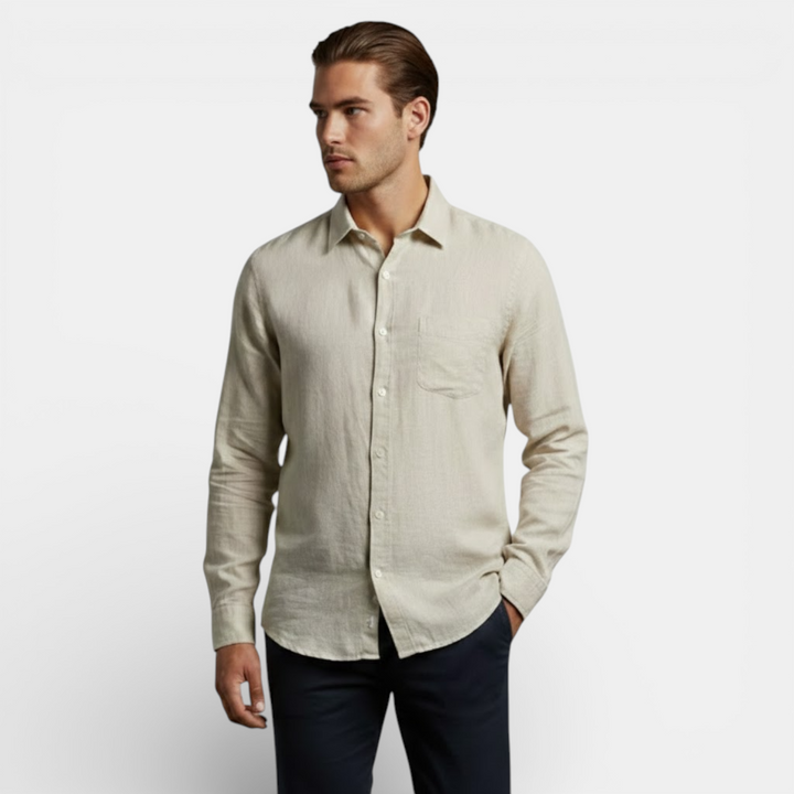 Female model wearing a lightweight long sleeve shirt against a plain background.