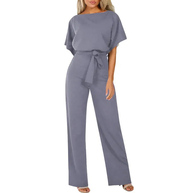 Model standing straight front full length plain background jumpsuit