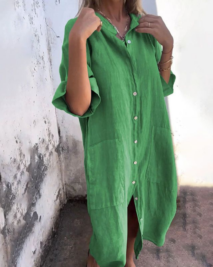 Woman wearing a comfortable everyday shirt dress against a clean background.