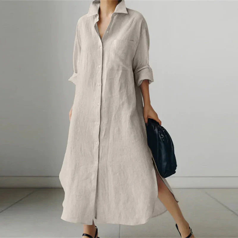 Woman model wearing a button down midi shirt dress on a plain background