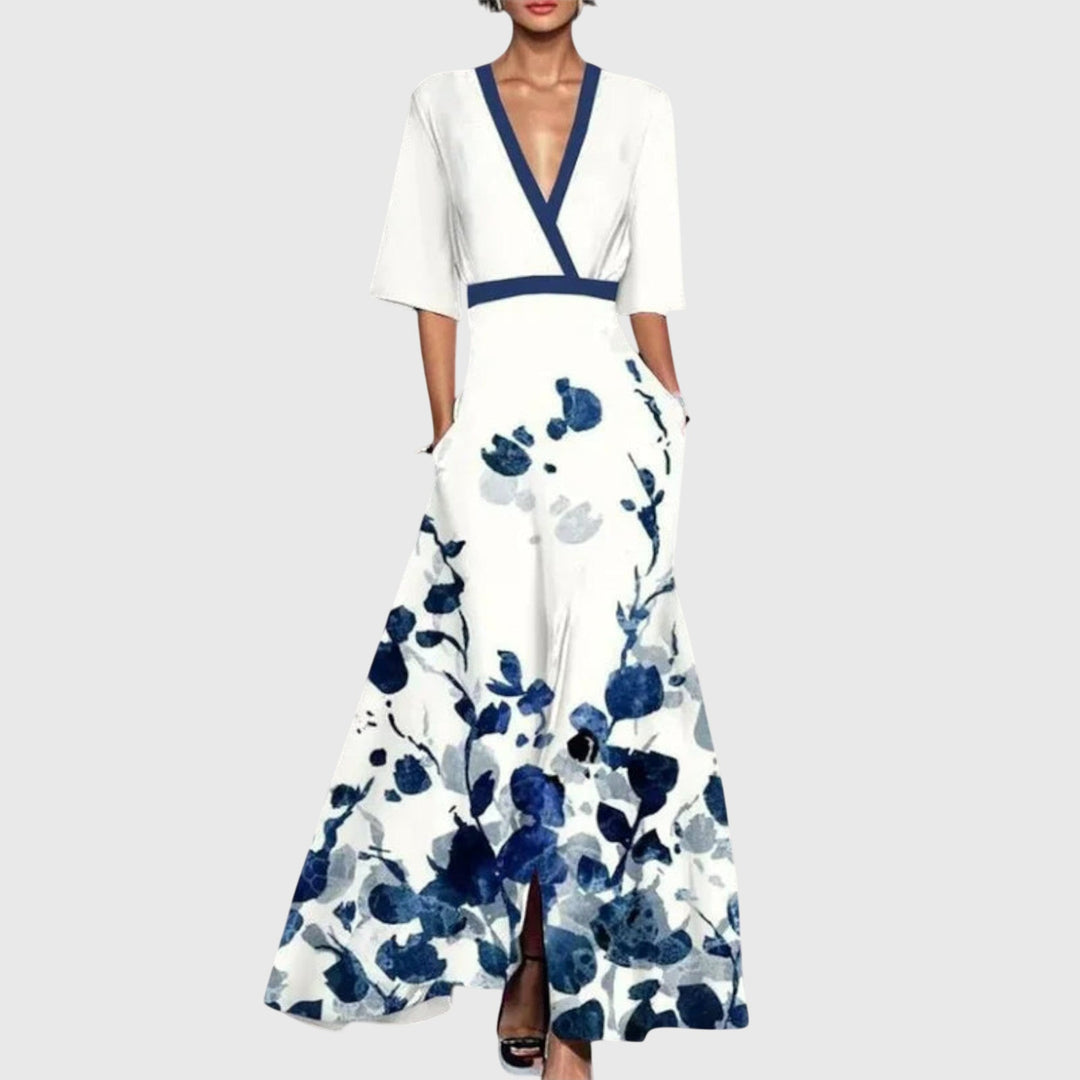 Model in a feminine floral wrap dress with a flattering v-neckline.