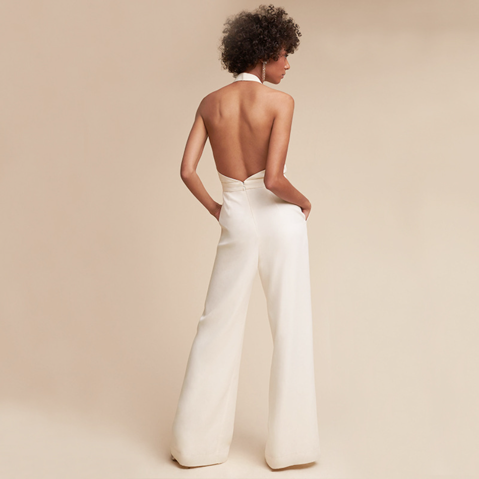 Back view angle, Model pose showcasing fit and back less design in plain background