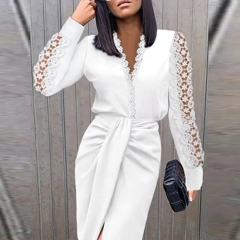 Woman model wearing an elegant lace sleeve midi dress against a plain background.