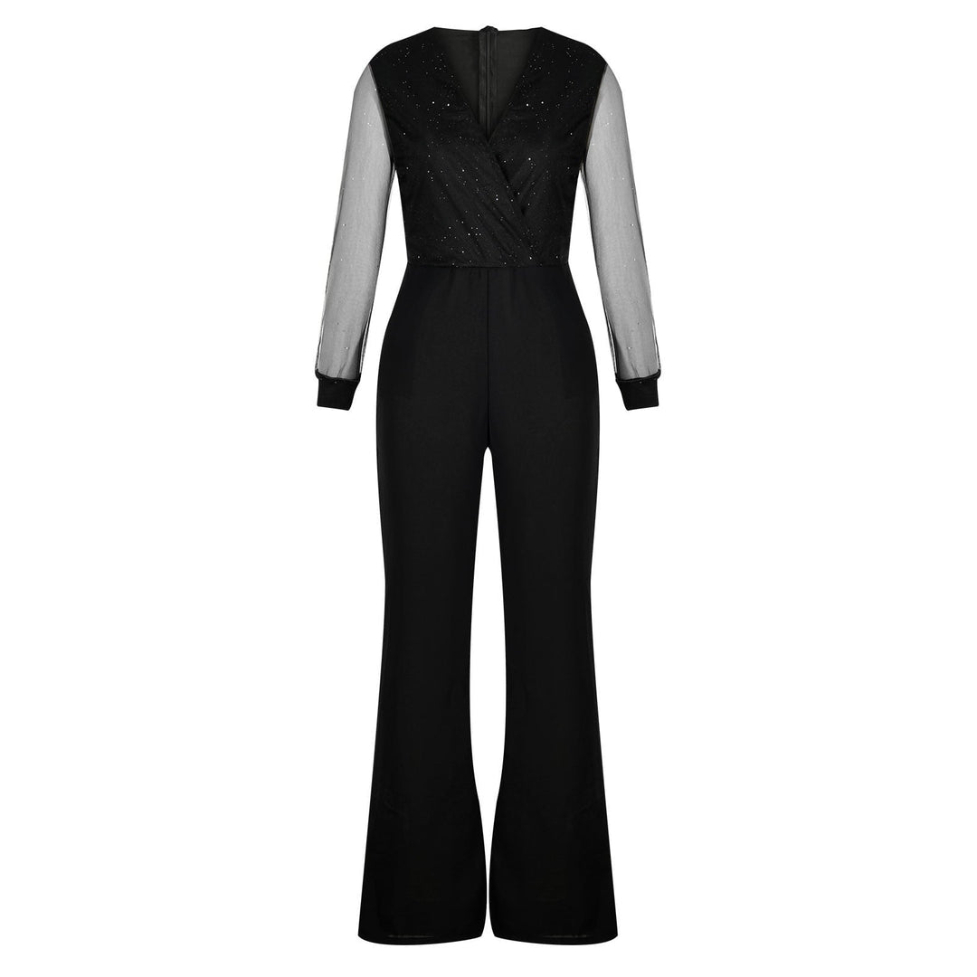 Model walking pose wearing wide leg jumpsuit plain background setting, back view