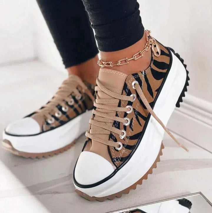 Fashionable animal print walking sneakers.