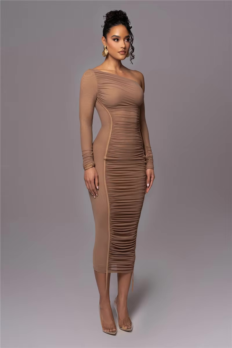 Woman model in an elegant one-shoulder midi dress with flattering ruching.