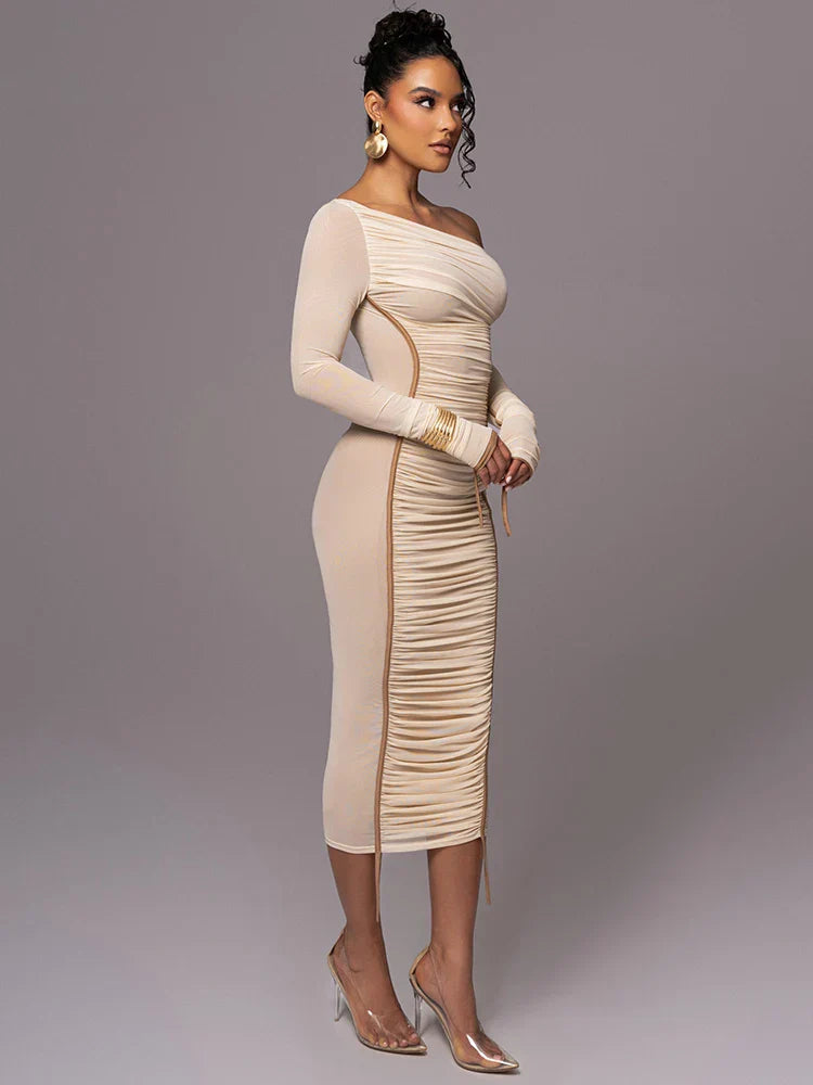 Model featuring a curve-enhancing ruched midi dress.