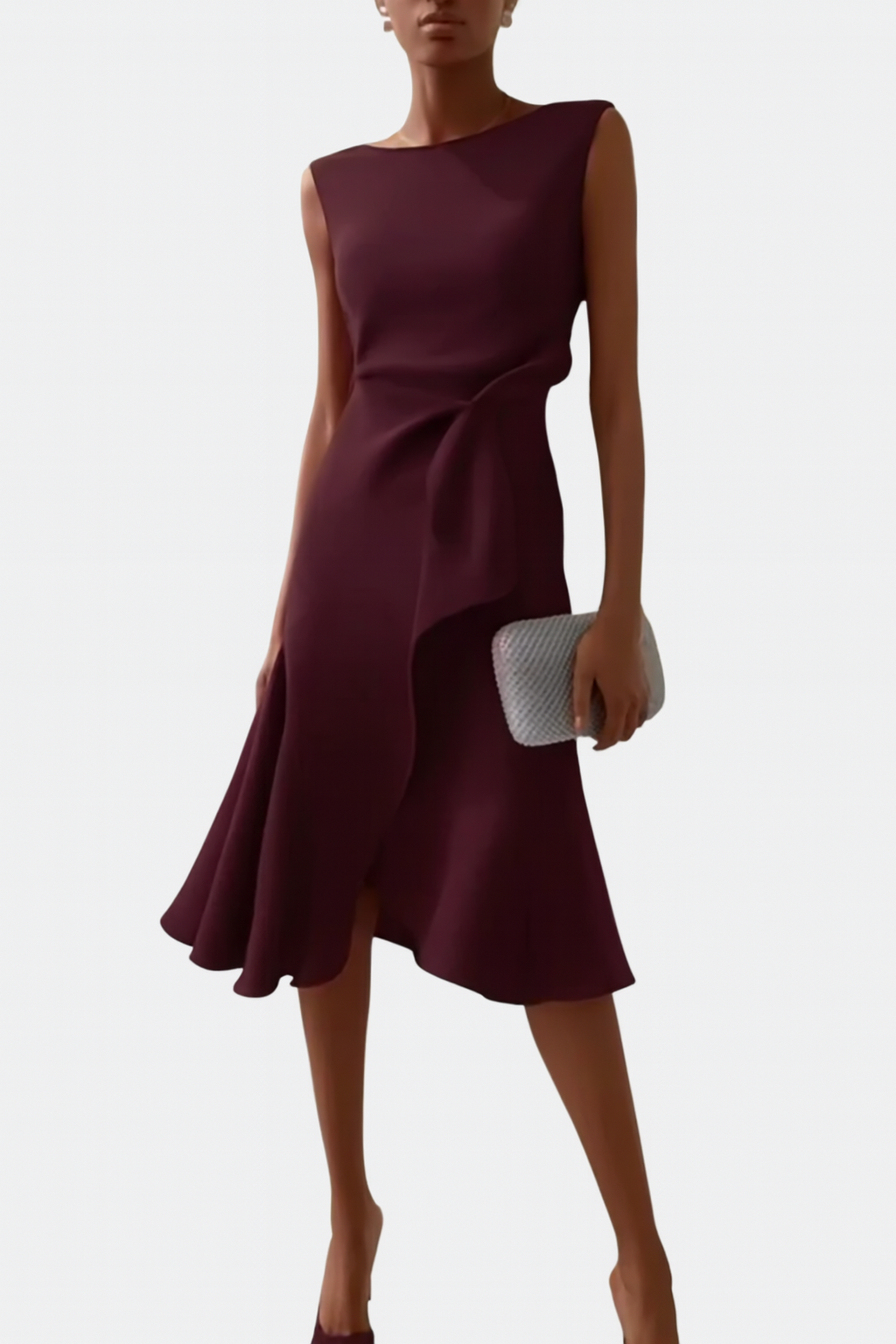Modern wrap midi dress styled on a woman model with clean backdrop.