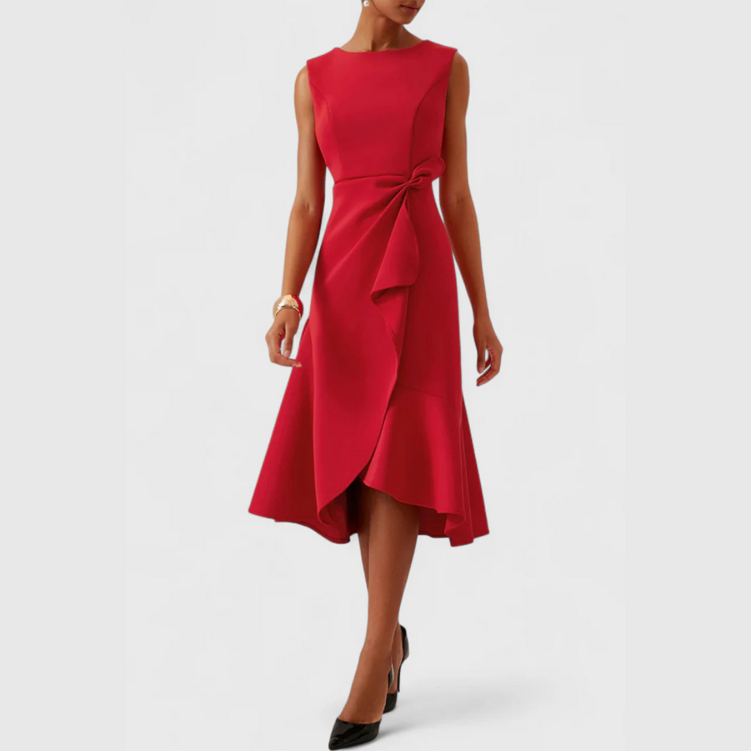 Sleeveless wrap midi dress worn by a woman model in a clean studio setting.
