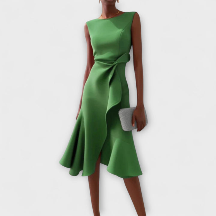 Flattering midi wrap dress styled on a woman model with a clean background.