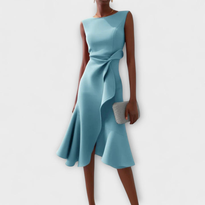 Elegant wrap midi dress worn by a woman model against a plain background.