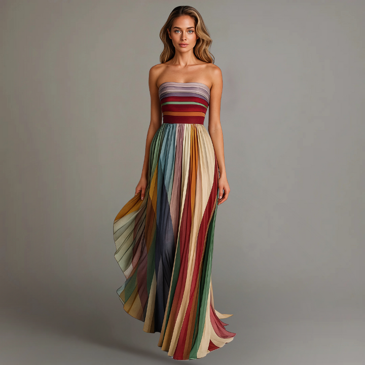 Woman model wearing a strapless A-line maxi dress on a clean background.