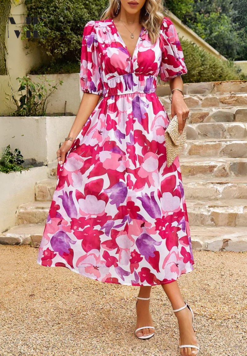 Easy wear floral midi dress for women modeled on a staircase background.