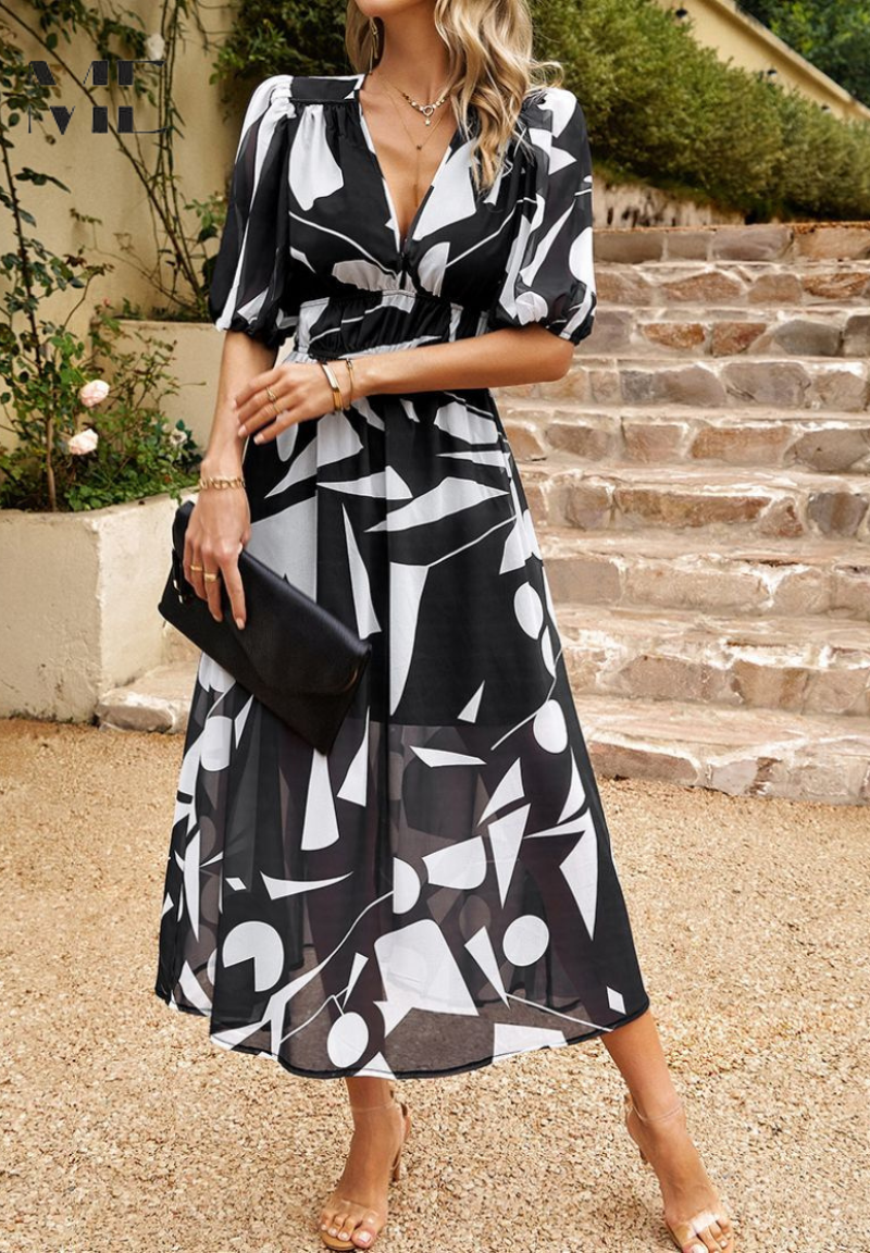 Woman model showcasing a floral V-neck midi dress with puff sleeve detail.