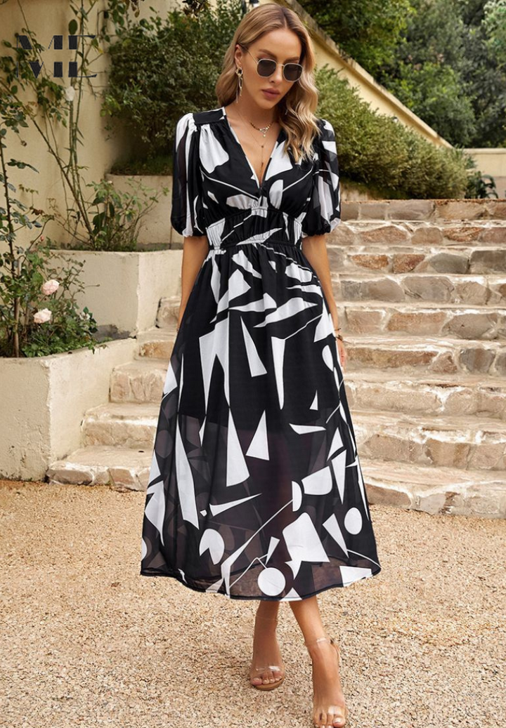 Woman model wearing a casual floral midi dress suitable for daily wear and occasions.