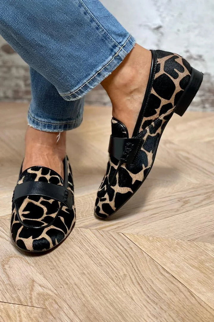 Zenobia | Women's Orthopedic Comfort Slip-On Cow Print Penny Loafers with Classic Strap — Black